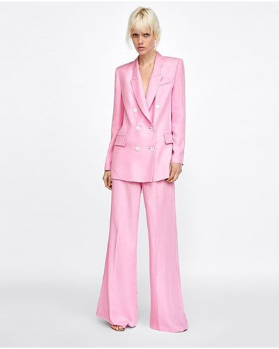 Experience Elegance: A stylish affair with the left or right pink trousers and pink jacket from Zara